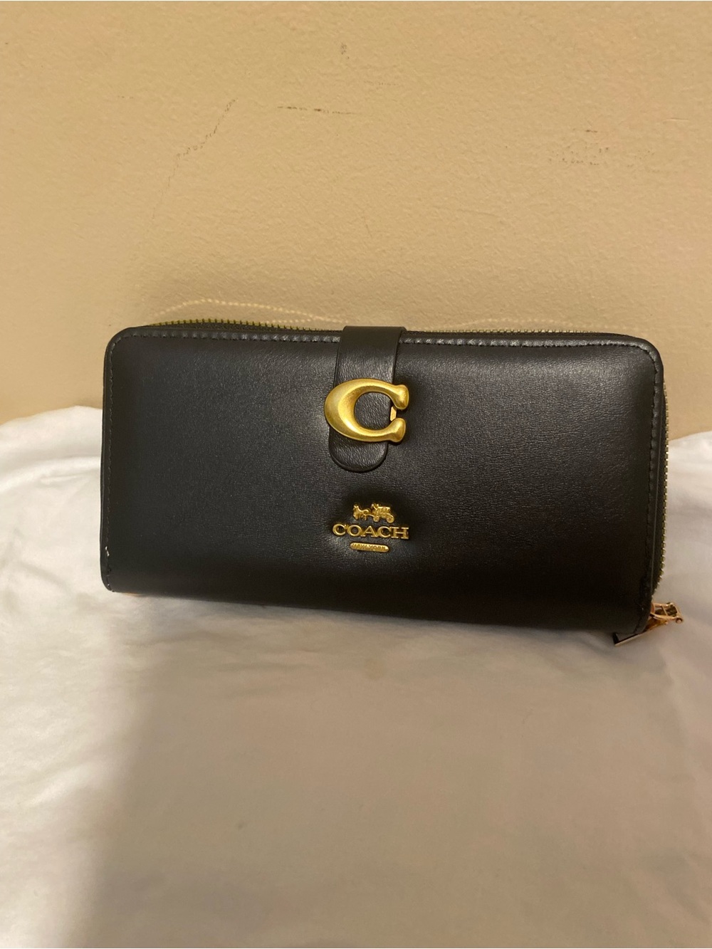 Coach New York Black Leather Zip Wallet with Gold 'C' Accent
